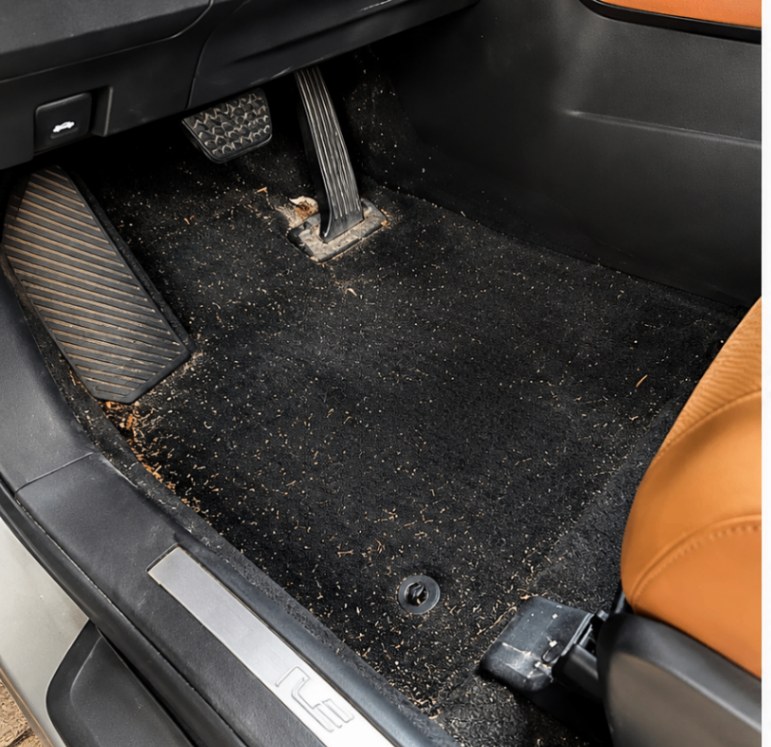 Vehicle floor mat and pedal area before